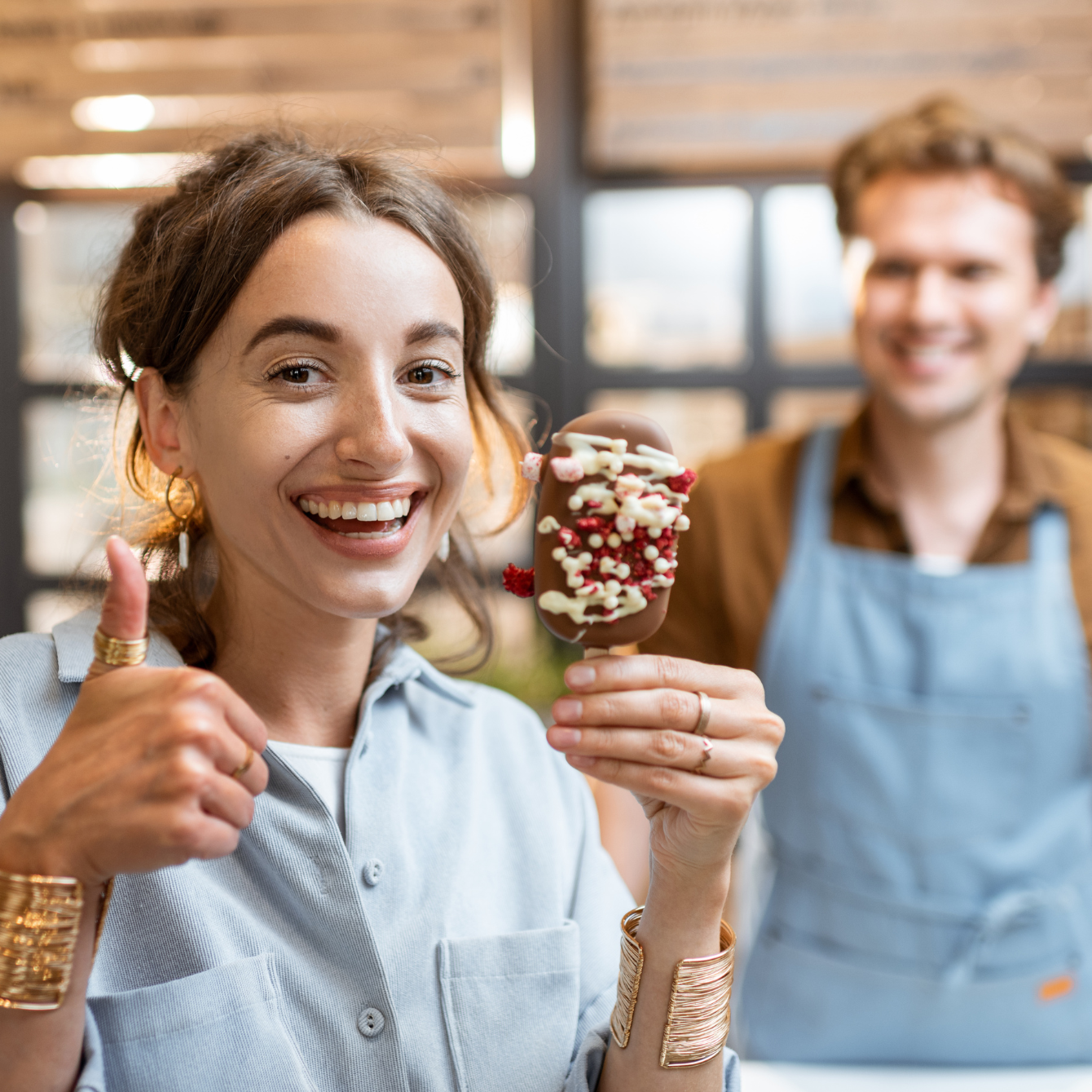 Female customer is redeeming an ice cream.