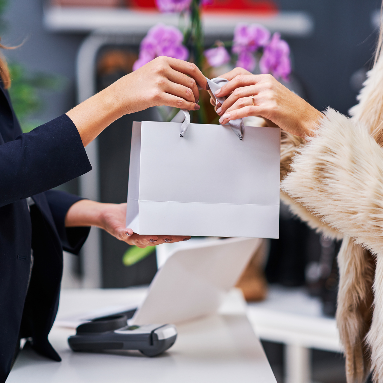 A customer is redeeming points and rewards in the store.